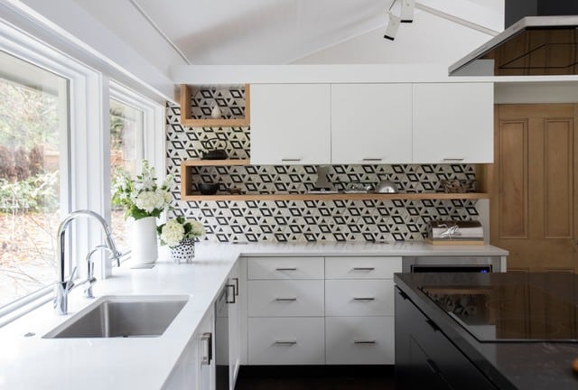 Bold Backsplash with White Kitchen Cabinet