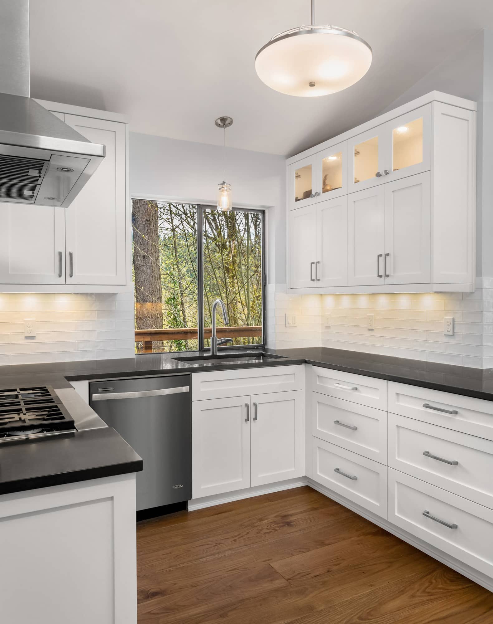 White Kitchen with Black Countertop