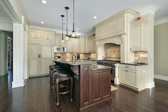 White Kitchen with a Dark Wood Island