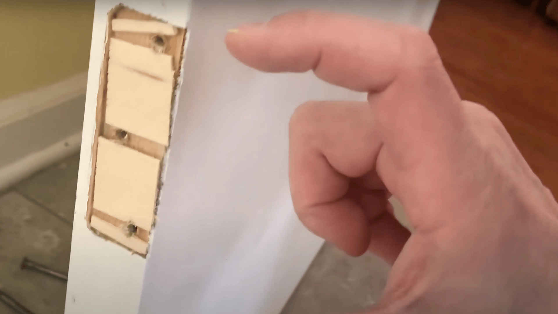 Insert the Shim Behind the Hinge