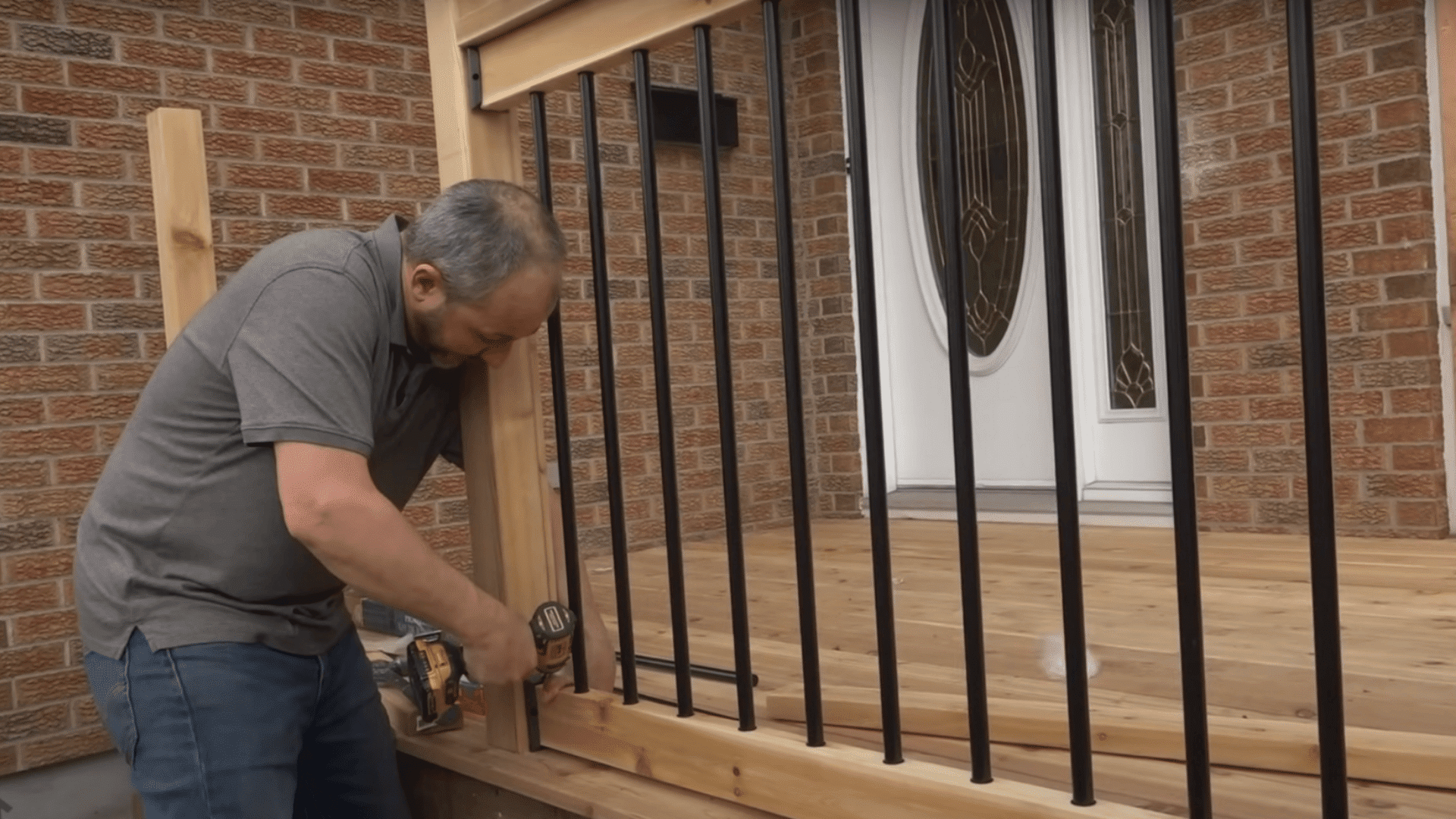 step four install rail sections to post